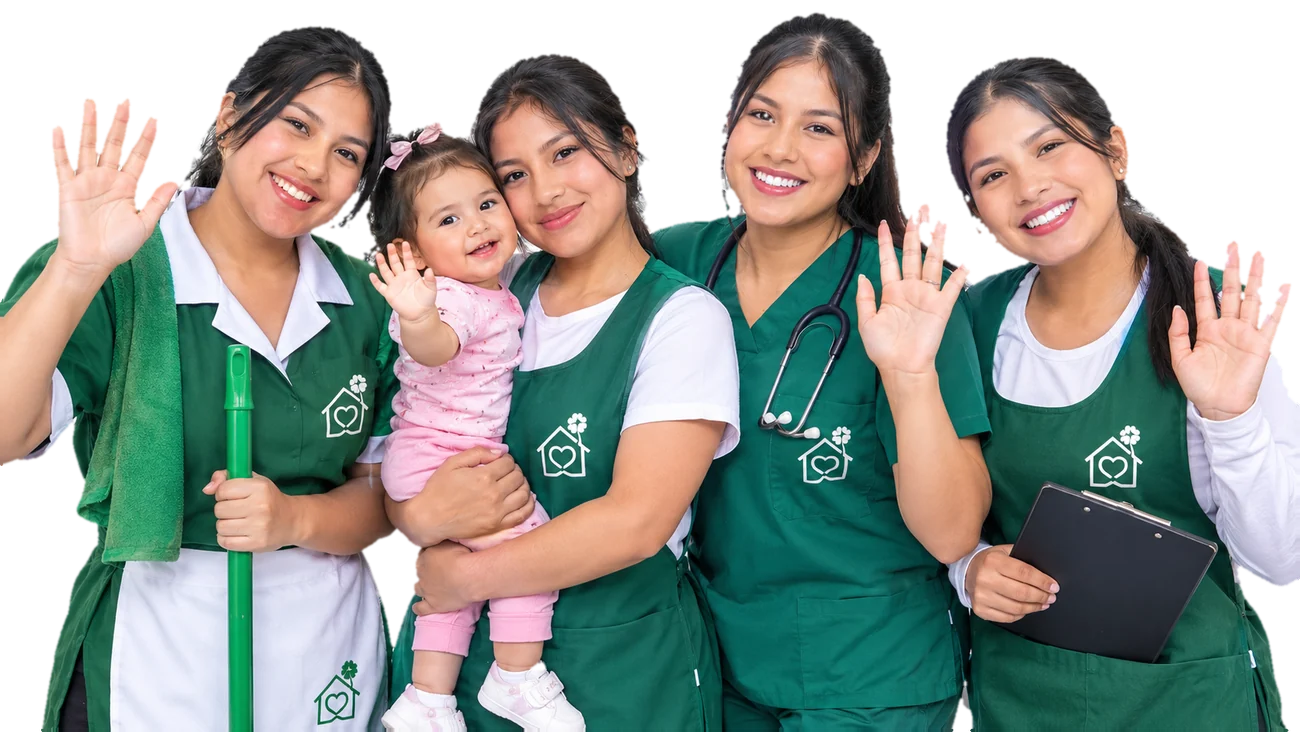 Cuatro profesionales de Agencia Los Portales saludando con una sonrisa, una de ellas con una bebé en brazos